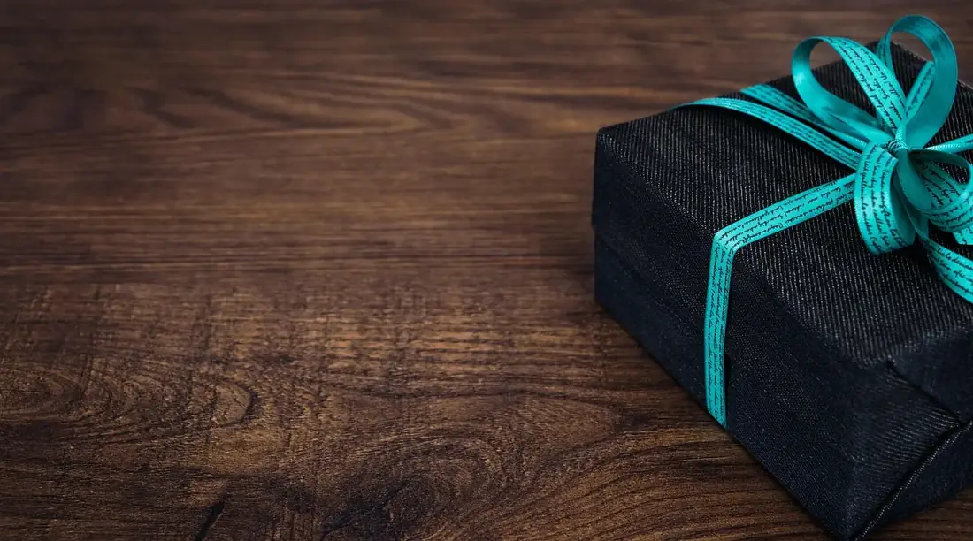 A wrapped product on a wooden table