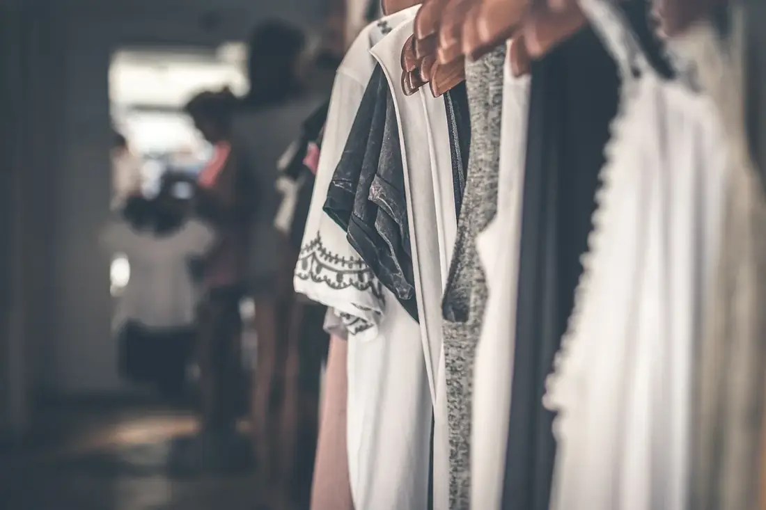 Clothes on a rail in soft light